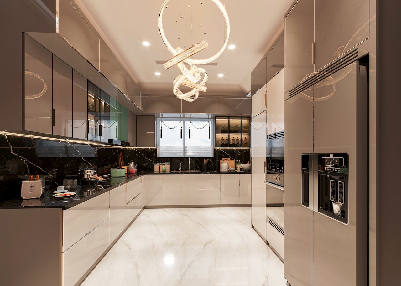 about-01 Elegant and modern kitchen featuring sleek cabinetry, marble floors, and stylish lighting.